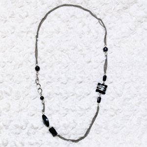 asymmetrical silver and black chain necklace